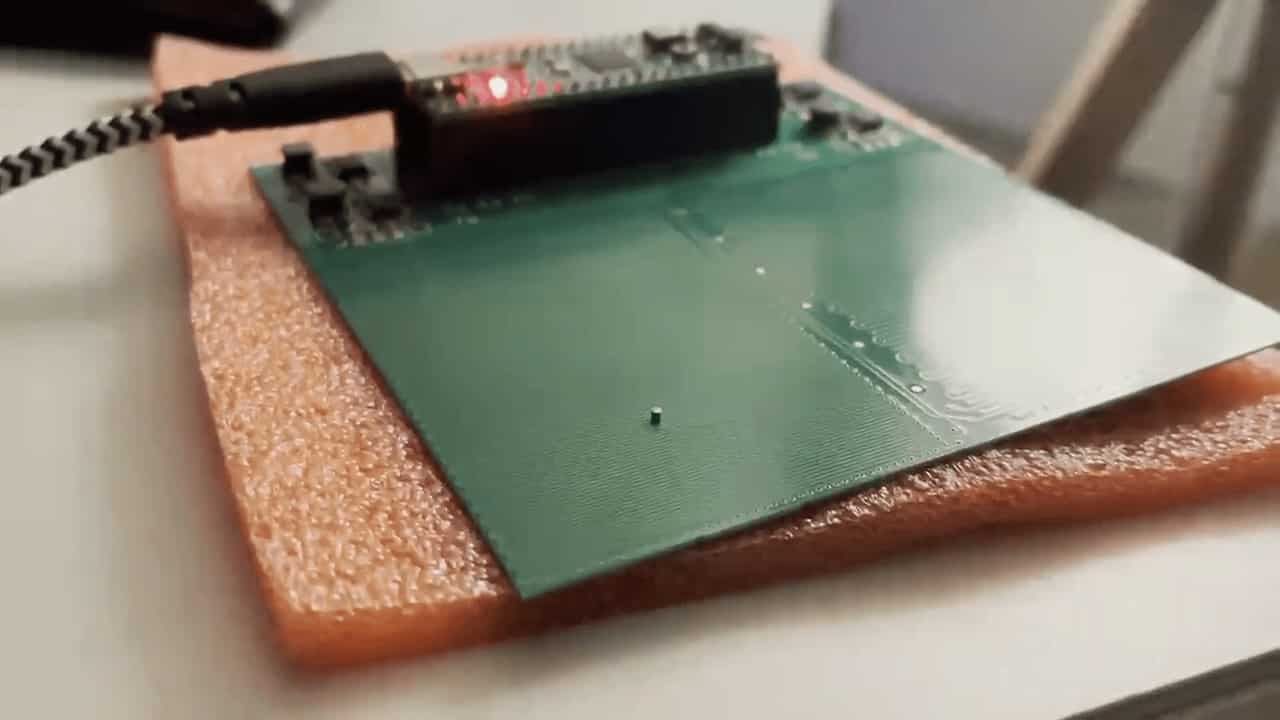 A 1mm disk magnet on a PCB